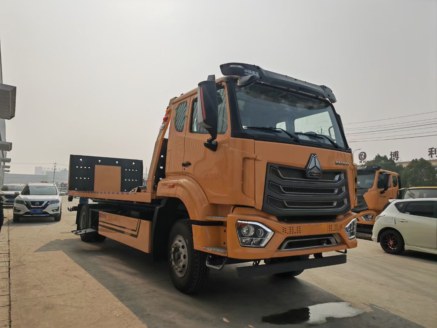 重汽豪沃10吨板一拖二清障车